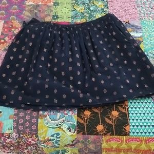 Navy and pink polka dot skirt with pockets